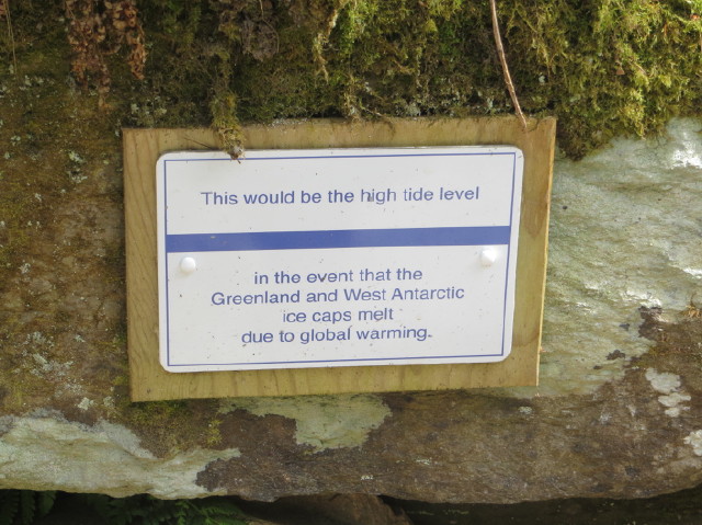 Some distance up the trail was a sign showing the possible future high tide level